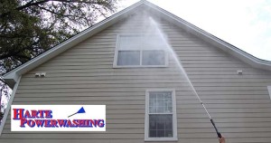 pressure washing a house