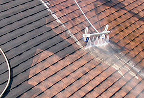Low pressure roof power washing